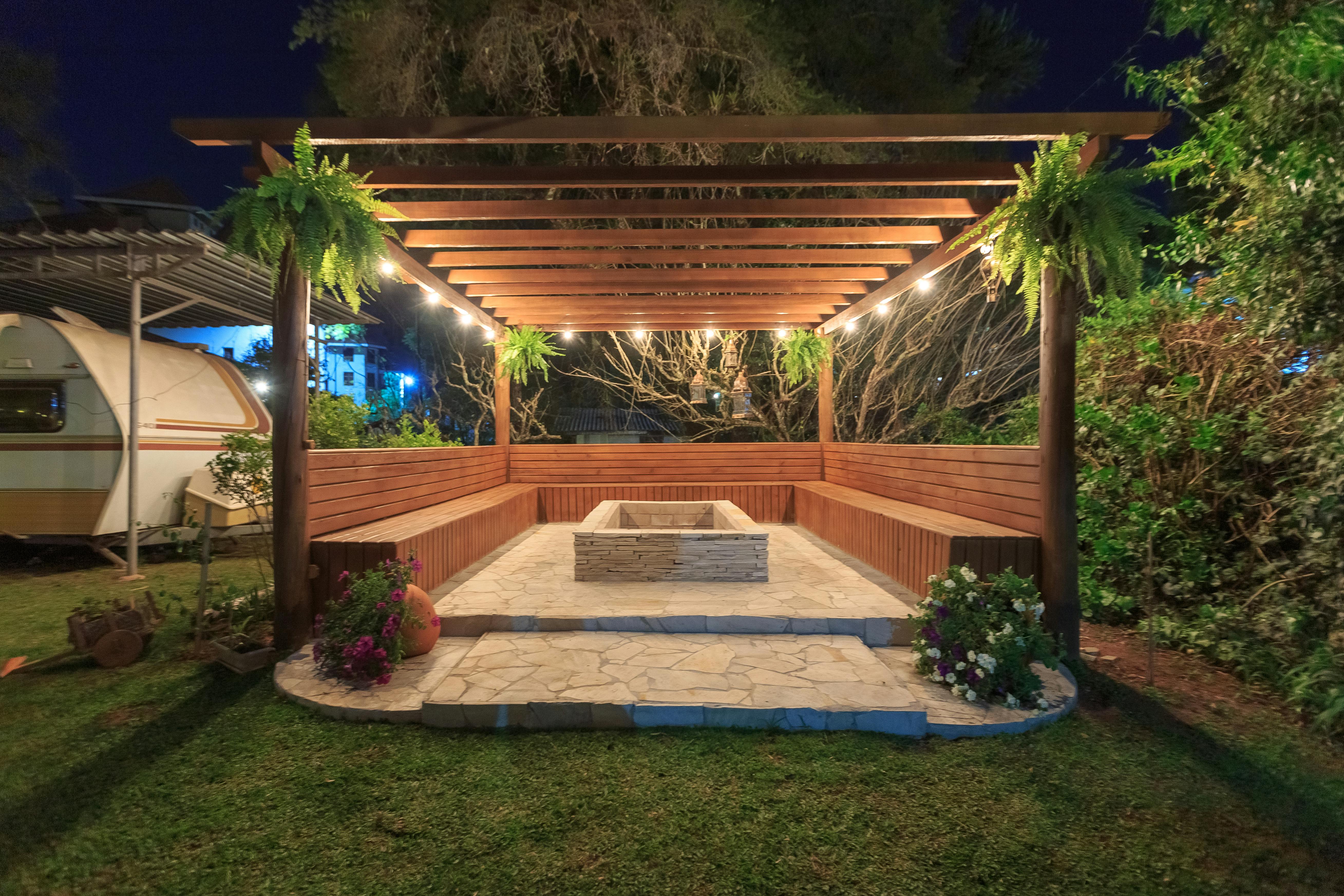 An elegant wooden pergola in a backyard garden